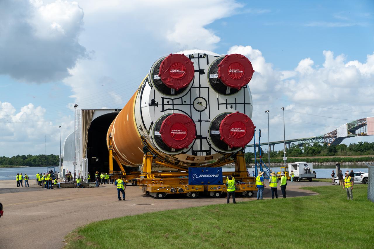 These images and videos show team members at Michoud Assembly Facility loading the first core stage that will help launch the first crewed flight of NASA’s SLS (Space Launch System) rocket for the agency’s Artemis II mission onto the Pegasus barge on Tuesday, July 16, 2024. The barge will ferry the core stage on a 900-mile journey from the agency’s Michoud Assembly Facility in New Orleans to its Kennedy Space Center in Florida. The core stage for the SLS mega rocket is the largest stage NASA has ever produced. At 212 feet tall, the stage consists of five major elements, including two huge propellant tanks that collectively hold more than 733,000 gallons of super chilled liquid propellant to feed four RS-25 engines at its base. During launch and flight, the stage will operate for just over eight minutes, producing more than 2 million pounds of thrust to help send a crew of four astronauts inside NASA’s Orion spacecraft onward to the Moon. All the major structures for every SLS core stage are fully manufactured at NASA Michoud.  NASA is working to land the first woman, first person of color, and its first international partner astronaut on the Moon under Artemis. SLS is part of NASA’s backbone for deep space exploration, along with the Orion spacecraft and Gateway in orbit around the Moon and commercial human landing systems, next-generation space, next-generational spacesuits, and rovers on the lunar surface. SLS is the only rocket that can send Orion, astronauts, and supplies to the Moon in a single launch. 